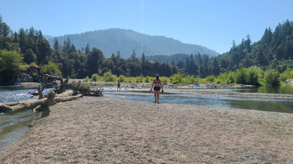 looking upriver across a gravel island at a beautiful tree covered mountain at Big Rock Day Use Area