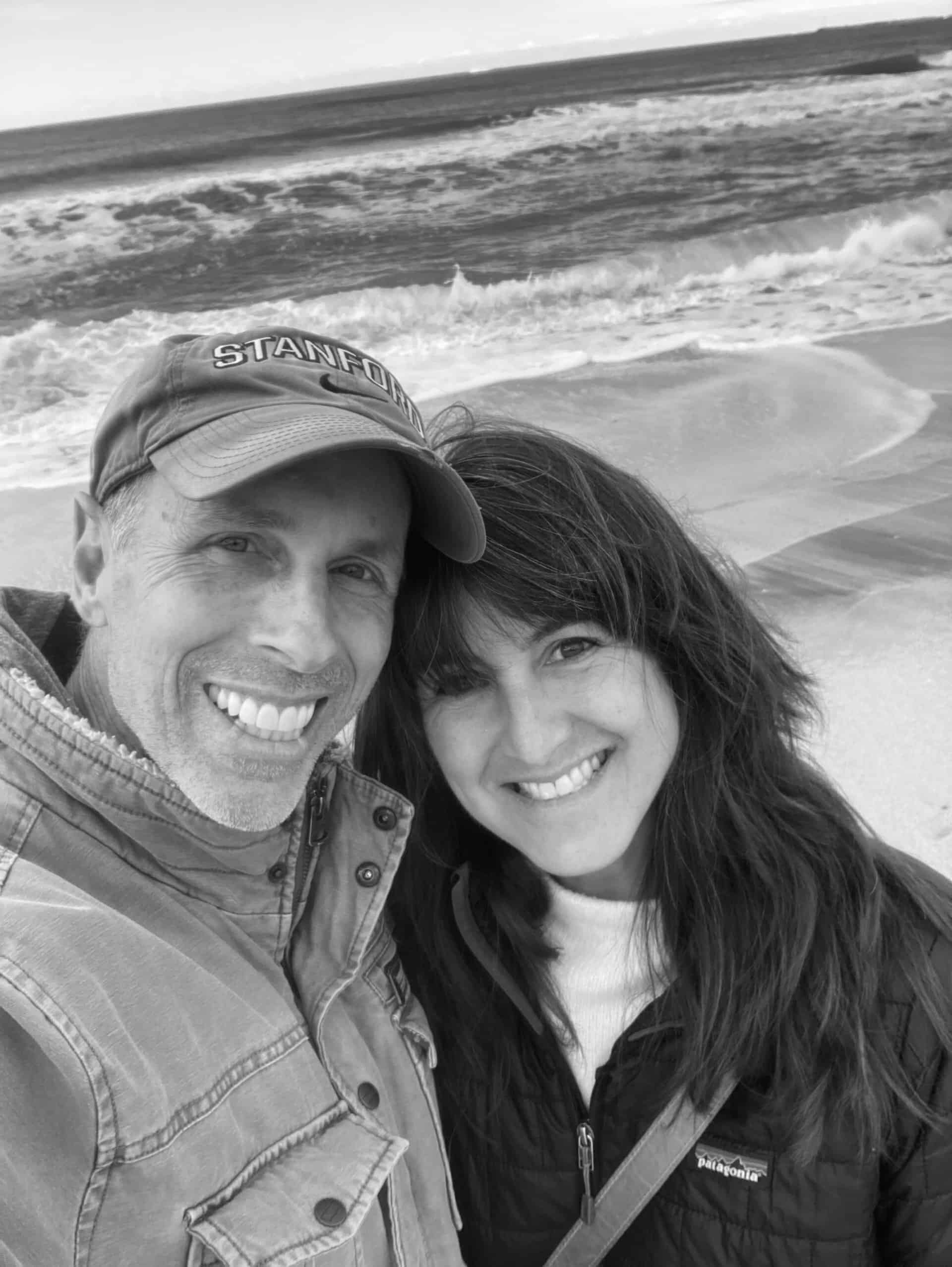 A black and white picture of Steve and Marla at the beach.