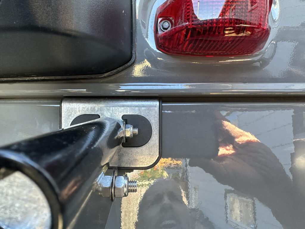 top ladder bracket on the rear van door