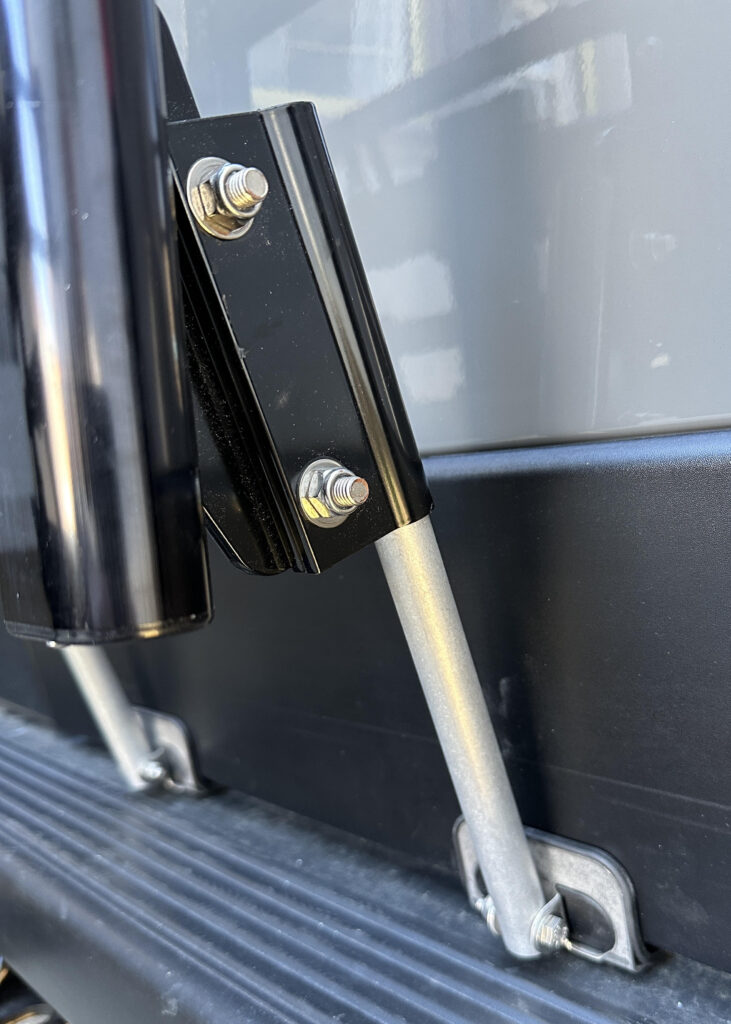 bottom ladder bracket on van door