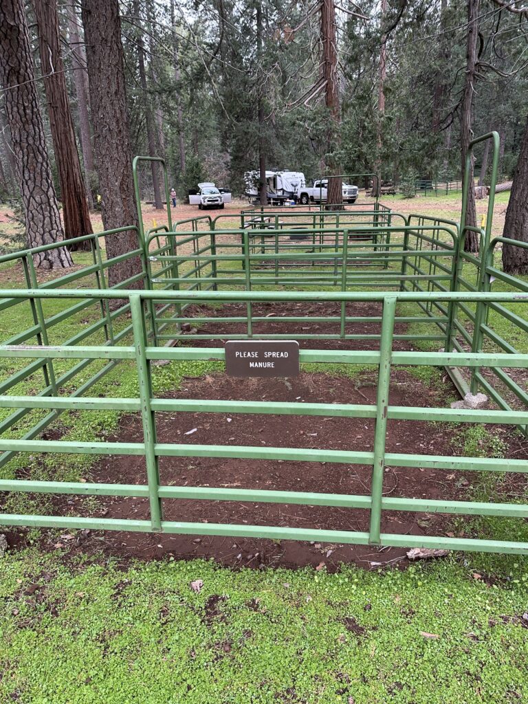 green horse corrals in the campground area