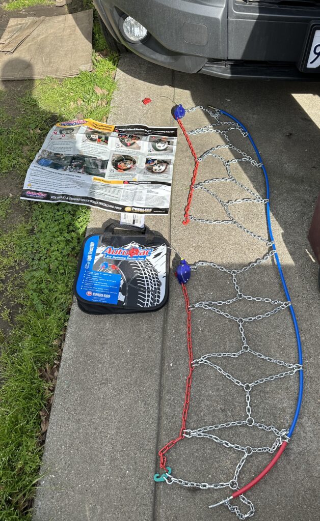 chains laid out in front of the tire