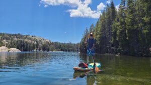 me standing on my paddle board on the reservoir