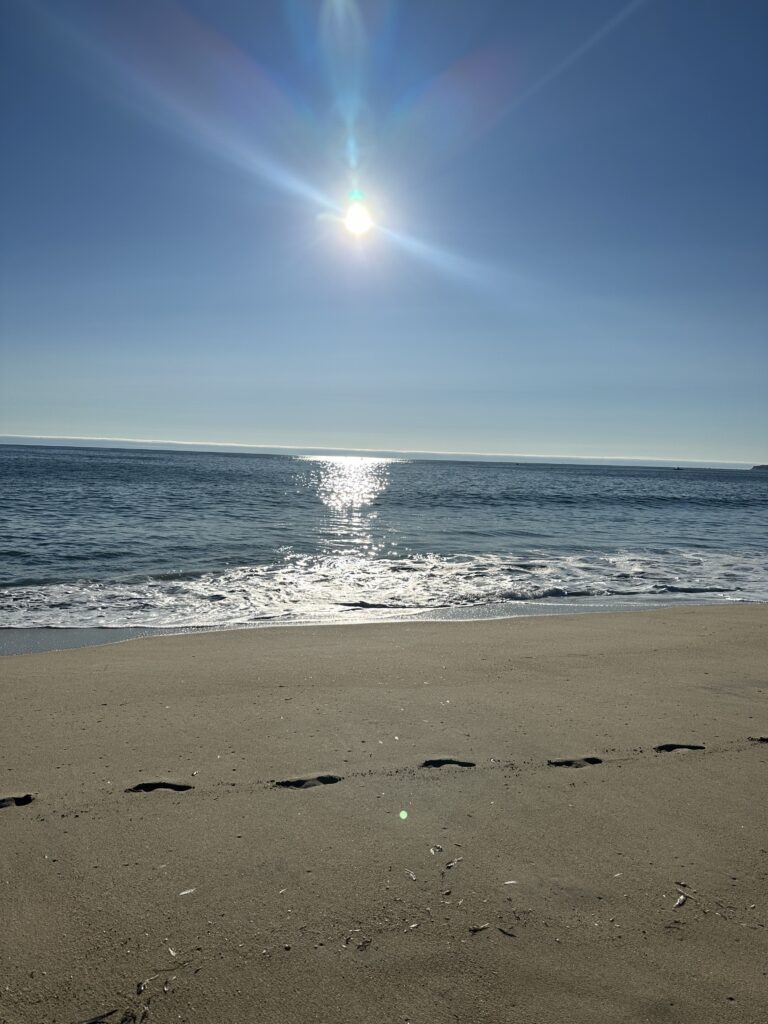 start of the sunset at half moon bay's poplar beach