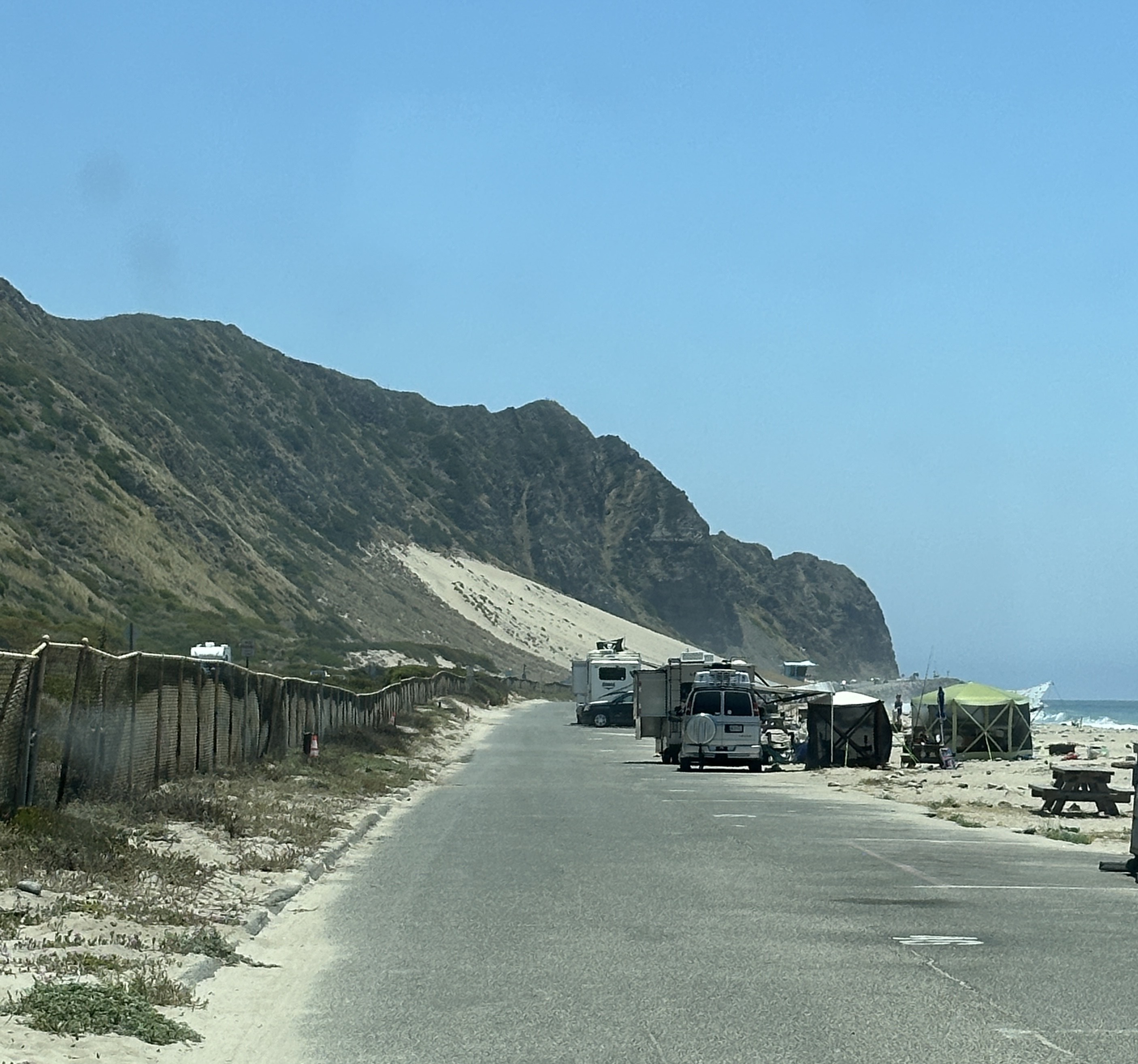 the campground road with campers in the distance