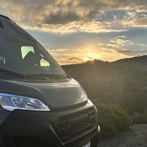 sunset with the front of the van in the foreground